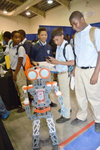 Students check out the popular UCCI robotics exhibit.