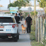 NEW: Murder, weapons charges filed in hostage case
