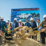 Champ helps break ground on Bodden Town boxing gym