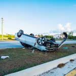 Car flips on Esterley Tibbetts, driver arrested