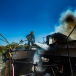 UPDATED: Firefighters respond to backyard boat fire