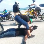 Motorbike rider seriously injured, left in road