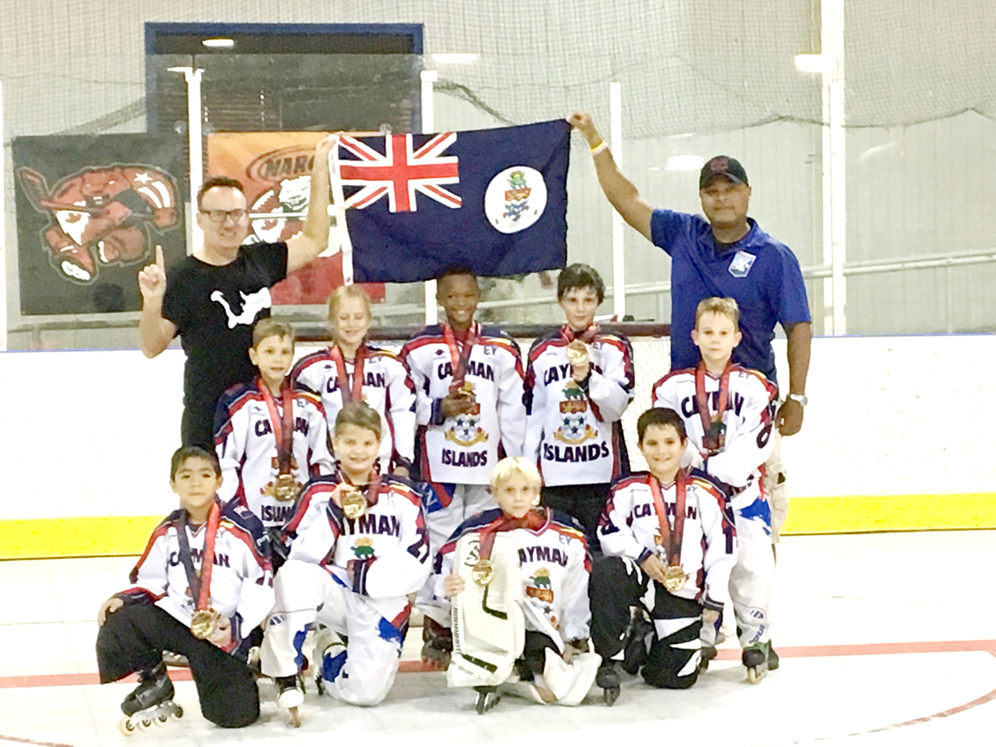 Youth roller hockey teams advance Cayman Compass