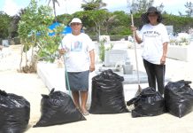 Volunteers clean up Boatswains Bay Cemetery
