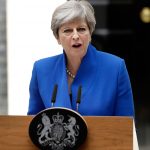 Wounded May vows to stay as UK PM; says Brexit will go on