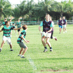 Corporate summer touch rugby heats up in Cayman