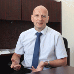 Prisons boss gets new contract