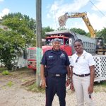 Police join West Bay residents in cleaning up King Road area