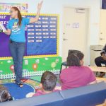 Civil servants read to Lighthouse students