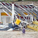 Cayman takes in 170 hurricane evacuees, more may come