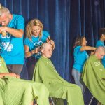 Students, teachers shave heads to support child cancer research