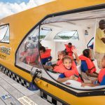 Literacy month has young North Side readers on the hunt at Camana Bay