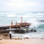 Tropical system moves on after wet weekend