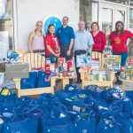 Camana Bay and food bank filling pantries