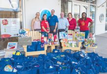 Camana Bay and food bank filling pantries