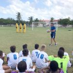 Football star Zola teaches free kicks for food bank