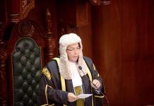 Bush calls for human rights chair to be fired