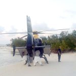 RCIPS helicopter, UK Navy head off Haitian migration