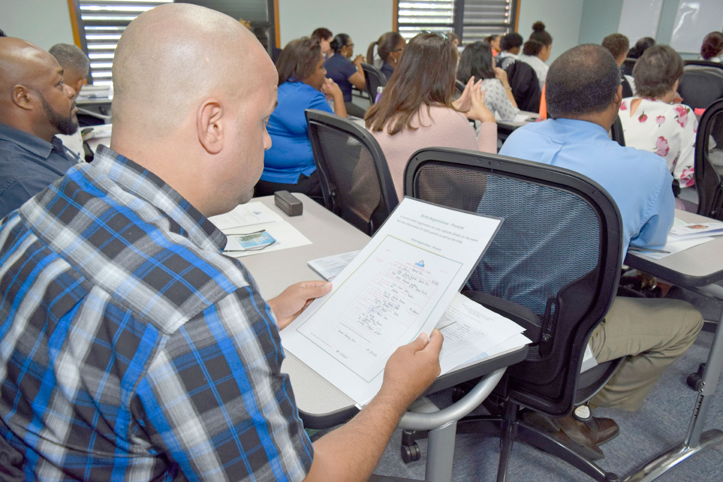 Border officers learn about fake documents - Cayman Compass