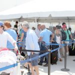 Airport passengers overflow to outdoors