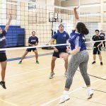 Corporate volleyball league competition heats up