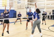 Corporate volleyball league competition heats up