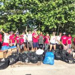 Swimmers dive into Earth Day cleanup