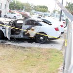 Update: Arrest made in police car arson