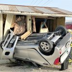 Car wrecks into downtown building