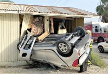 Car wrecks into downtown building