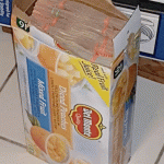 Police: $220,000 found inside cardboard box