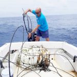 Large floating Styrofoam lure removed from water