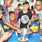 YMCA campers combining bake-off and cultural lessons