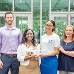 Junior achievers sell bags for charity