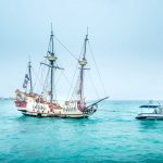Jolly Roger pirate ship runs aground