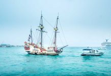 Jolly Roger pirate ship runs aground
