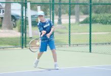 Junior tennis players swing into action