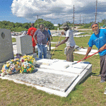 Community rallies to paint Bodden Town cemetery