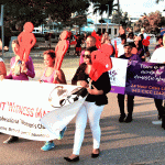 Marchers walk in silence to honor victims of domestic violence