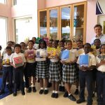 AIMA Cayman donates school supplies to George Town Primary