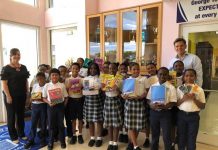 AIMA Cayman donates school supplies to George Town Primary