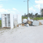 Household junk, en route to landfill, piles up on streets