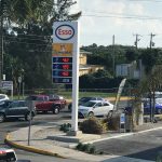 Gas prices fall, but not as much as in U.S.