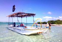 Restored glass-bottom boat now Little Cayman tourist vessel