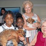 Puppies bring joy to Pines residents