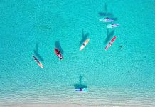 Paddleboarders stand up for cancer survivors