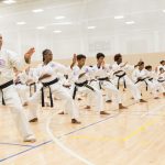 Fifty-two martial artists make the grade