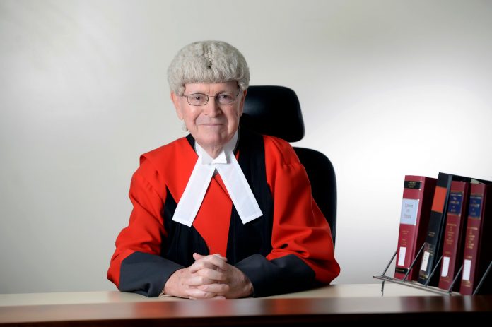 Justice Charles Quin