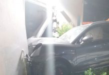 Car crashes into airport building