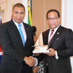 Holness celebrates Cayman/Jamaica bonds, wary of future